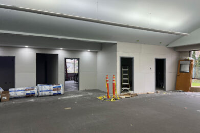 Study rooms, multi-use room and entry to new addition with drywall