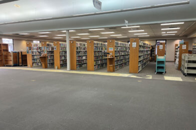 Adult section with new carpet and paint with shelves and books back in place