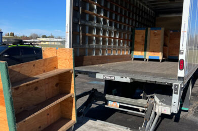 Empty book carts being loaded in a truck