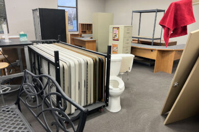 Programs room being used as storage area, including toilets