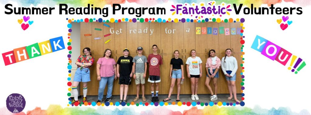 Nine smiling teenagers standing against a wall of brown cabinets.